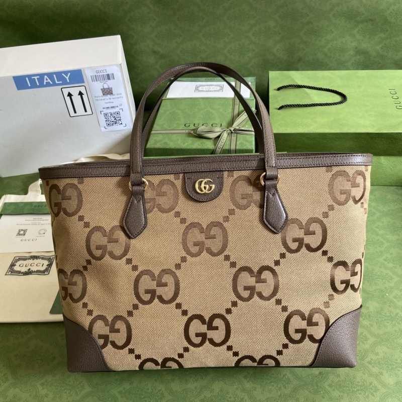 G*u*i shopping bags